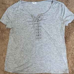 Gray, criss crossed tee